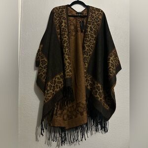 Cejon Brown leopard print poncho with fringe. Size: O/S New with Tag